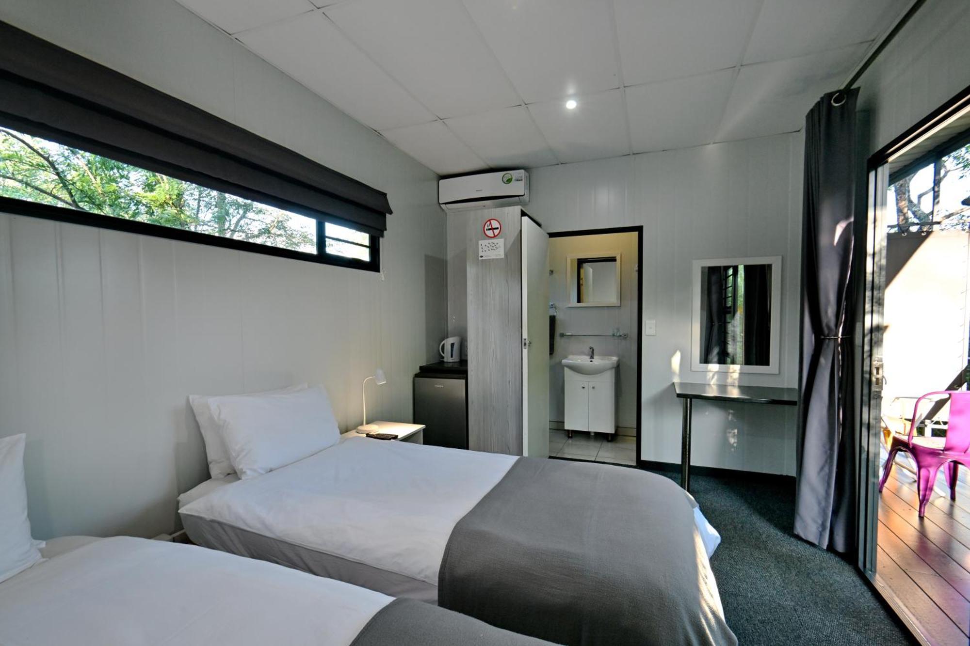 Sleepover Kruger Gate Skukuza Rom bilde